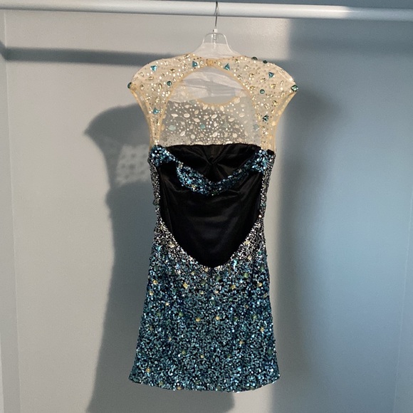 Open back, Size 8 dress, black with silver and blue sequins, green and gold gems - Picture 2 of 2